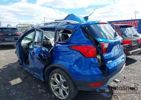 2019 Ford Escape Titanium из США, поврежденный, VIN 1FMCU9J94KUC57477